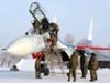 Russian pilots disembark from a Su-27 fighter jet - a top arms export. (AP)